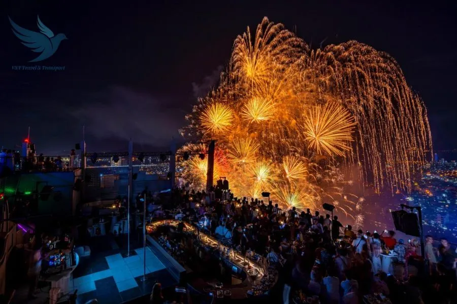 Watching the Danang firework show from a local rooftop bar